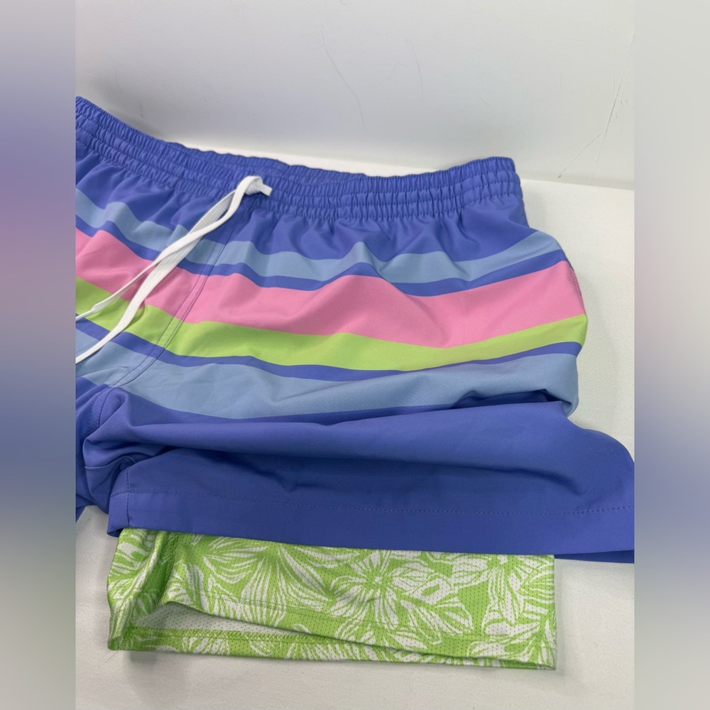 chubbies Men's Blue Swim Trunks with Pink and Lime Stripes - Picture 5 of 8